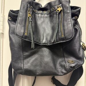 The Sak Black Pebbled Leather & Canvas Zipper Backpack